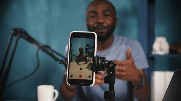 Editorial illustration for Canva, CapCut, or Later? The Three Apps That Cover a Smartphone-Only Content Workflow